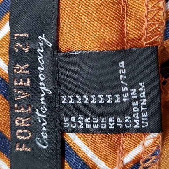 FOREVER 21, wide leg pants size medium. Gold/rust color. With geometric design. - Picture 5 of 6